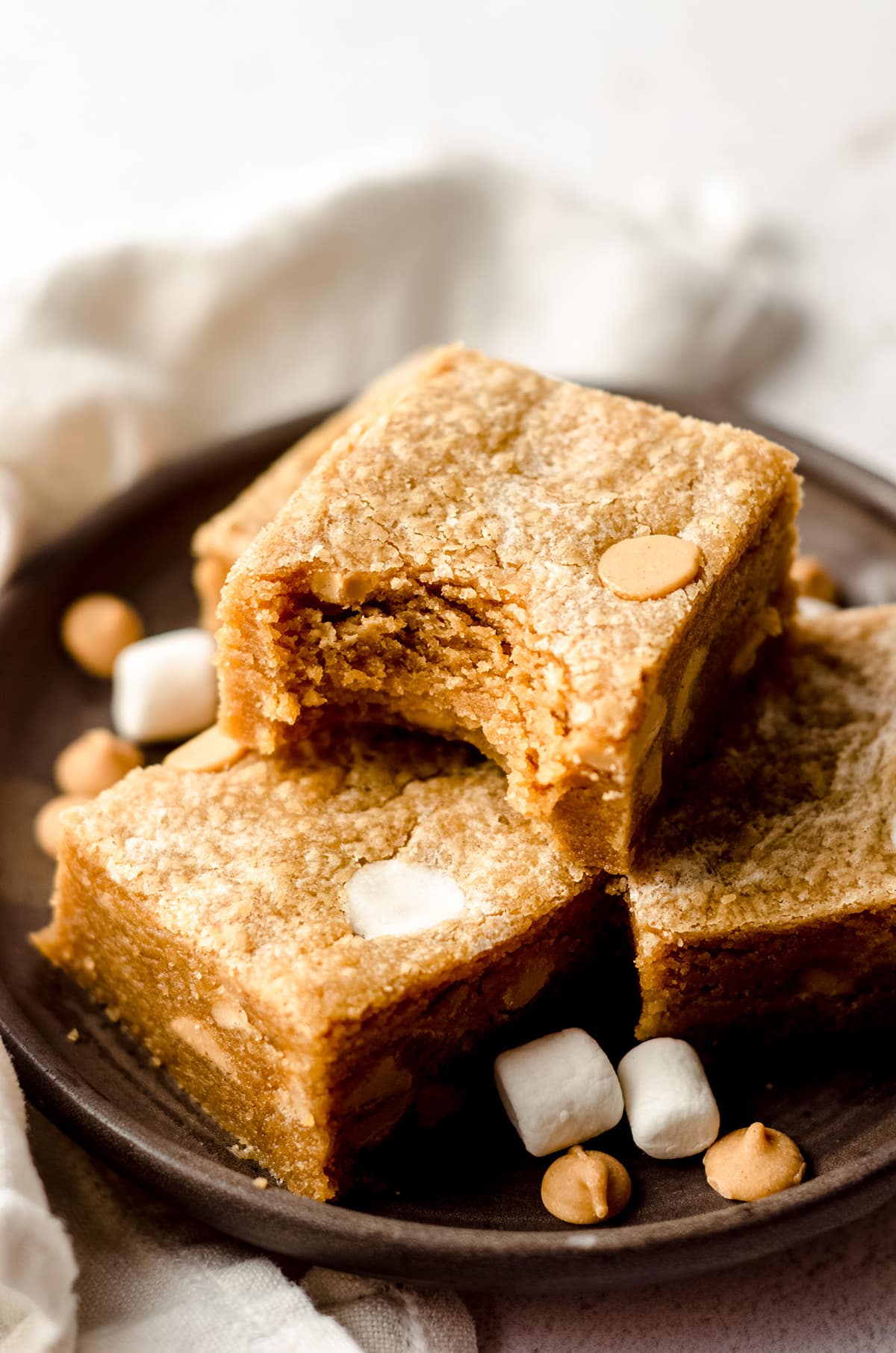 fluffernutter bars with a bite taken out of one