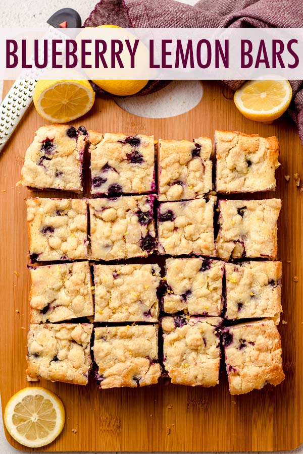 A sweet and creamy lemon cheesecake filling bursting with blueberries sits atop a lemon shortbread crust with lemon shortbread crumbles on top. via @frshaprilflours