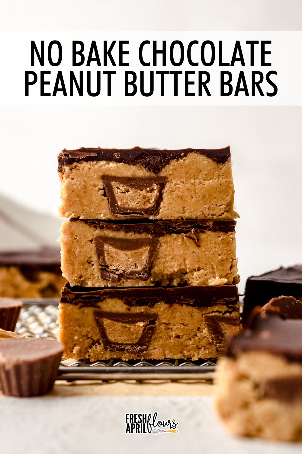 This no bake peanut butter bars recipe is next-level delicious! With the addition of mini peanut butter cups to the filling, each bar has that decadent peanut butter filling and rich chocolate layer on top that you expect from traditional peanut butter bars. Made with only 7 ingredients! via @frshaprilflours