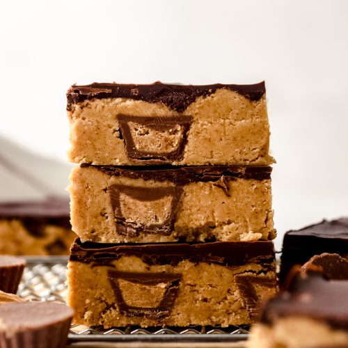 Three peanut butter bars stacked on top of each other.