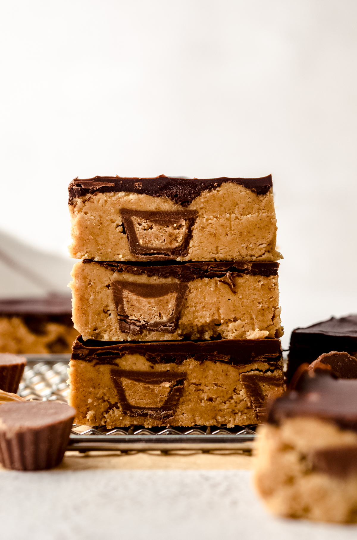 Three peanut butter bars stacked on top of each other.