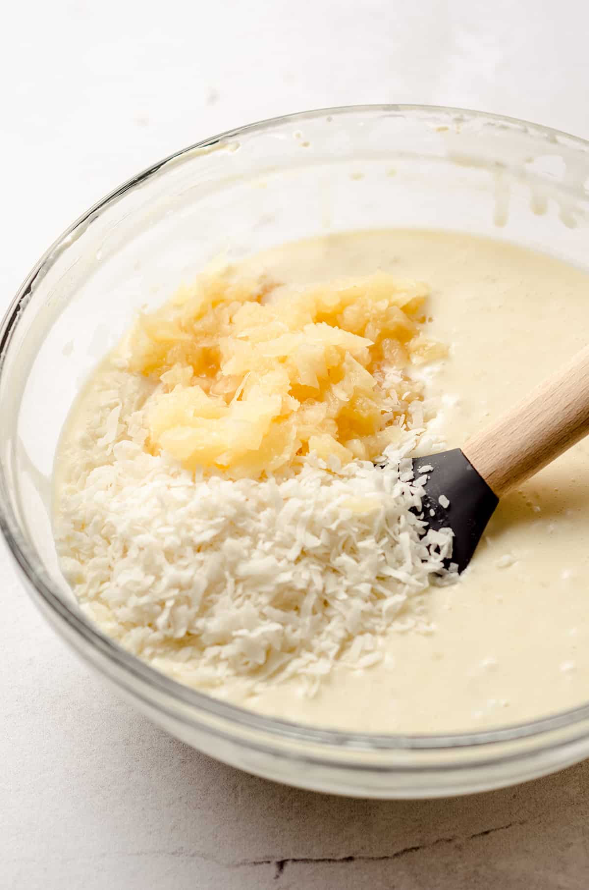 piña colada squares batter in a bowl