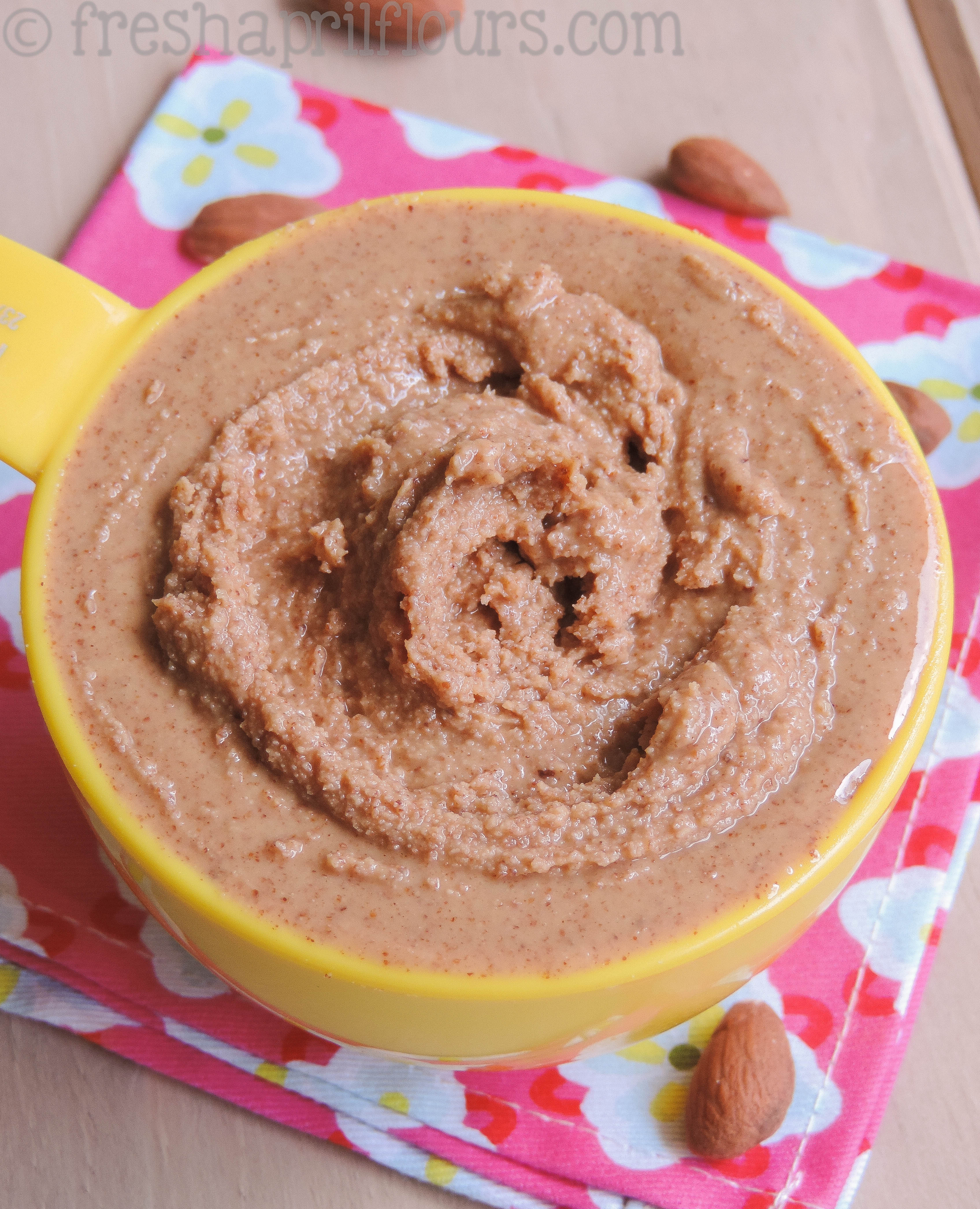 almond butter in a measuring cup