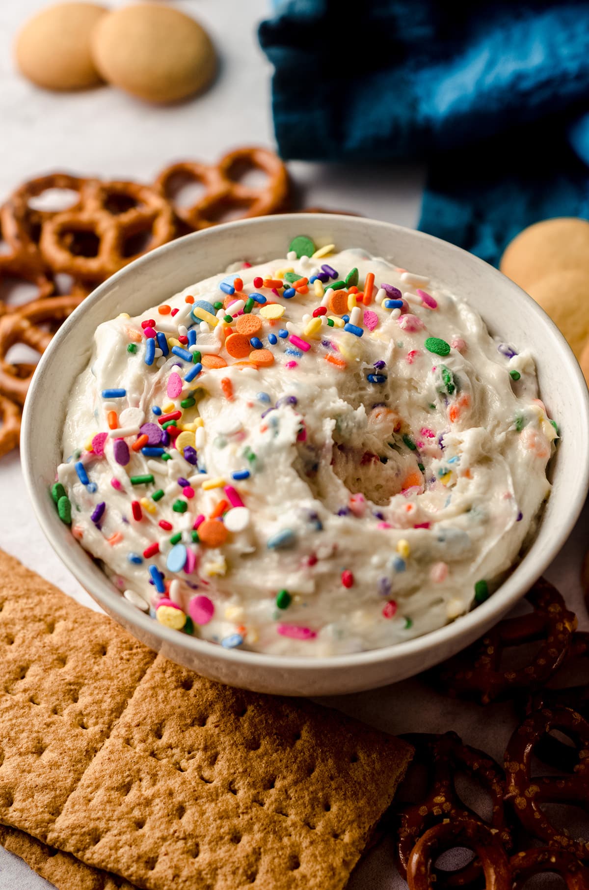 bowl of cake batter dip with a scoop taken out of it