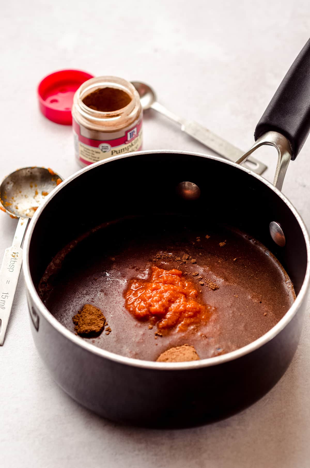 pumpkin spice coffee creamer ingredients in a saucepan