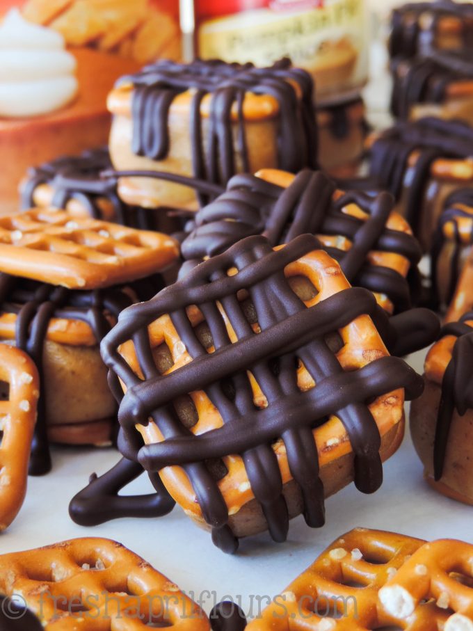 pumpkin peanut butter pretzel bites drizzled in chocolate