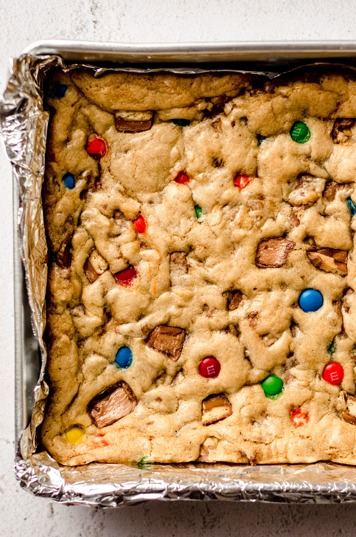 candy bar blondies baked in a baking pan