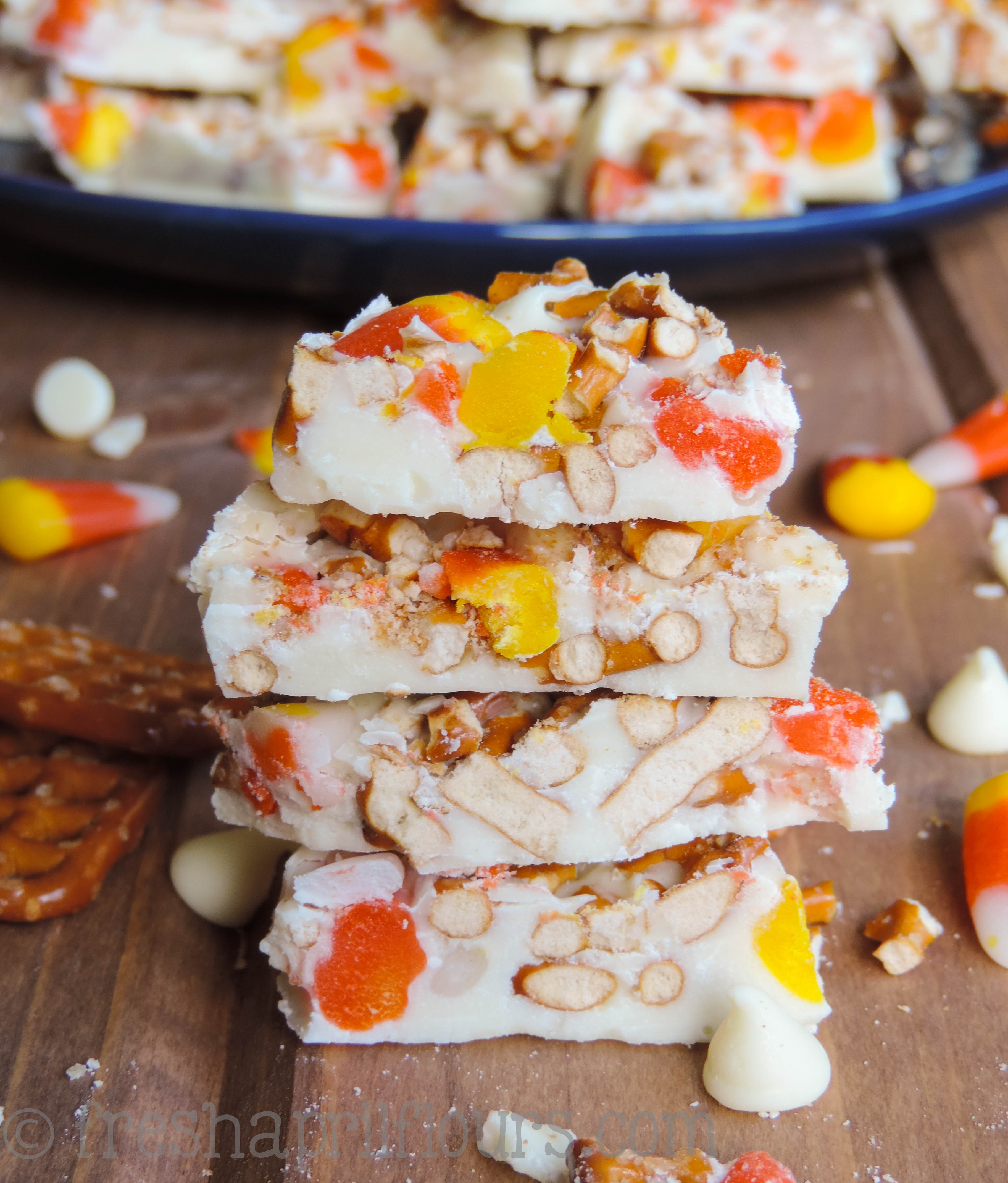 Candy Corn Pretzel Bark: This sweet, salty, chewy, and crunchy bark is a great way to use up some of your Halloween candy corn. via @frshaprilflours