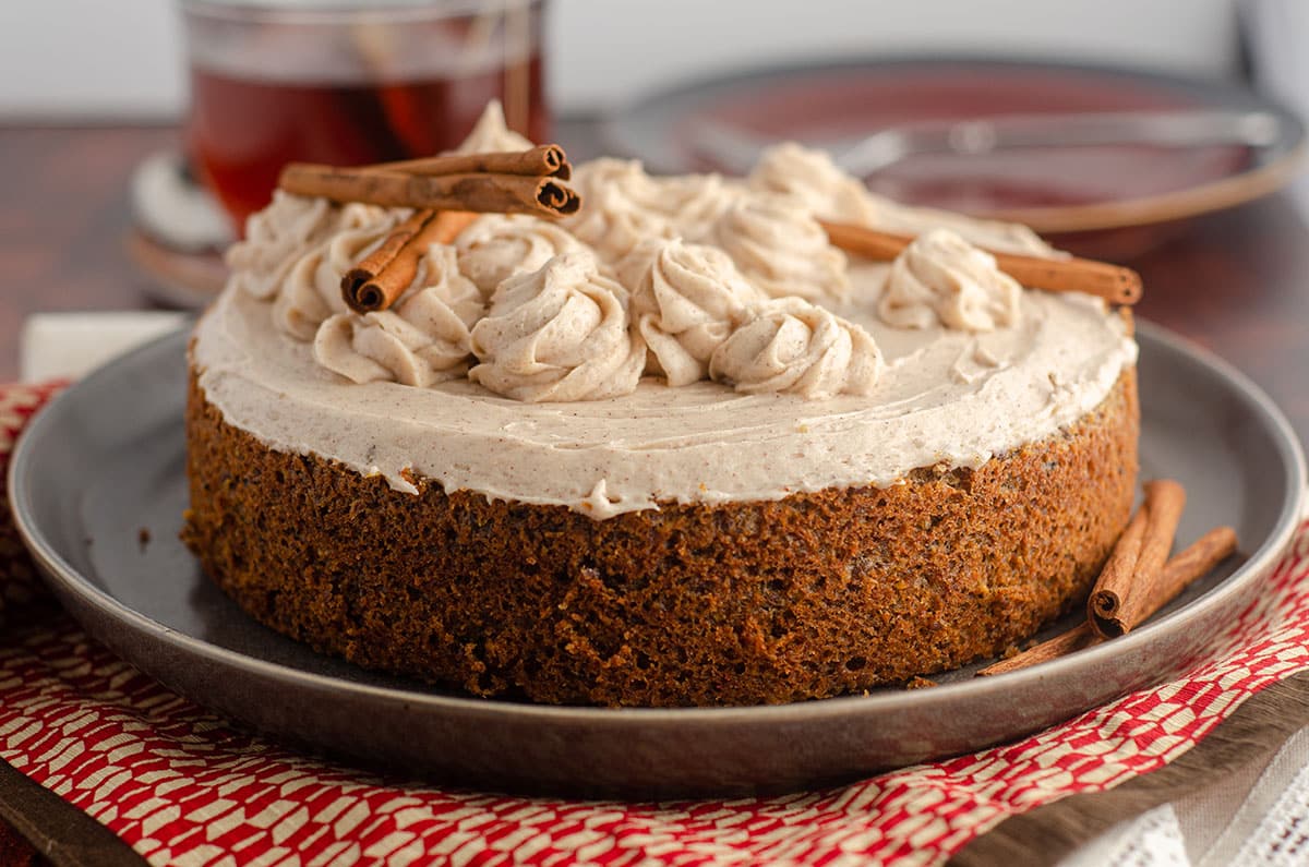 whole chai cake decorated with cinnamon sticks