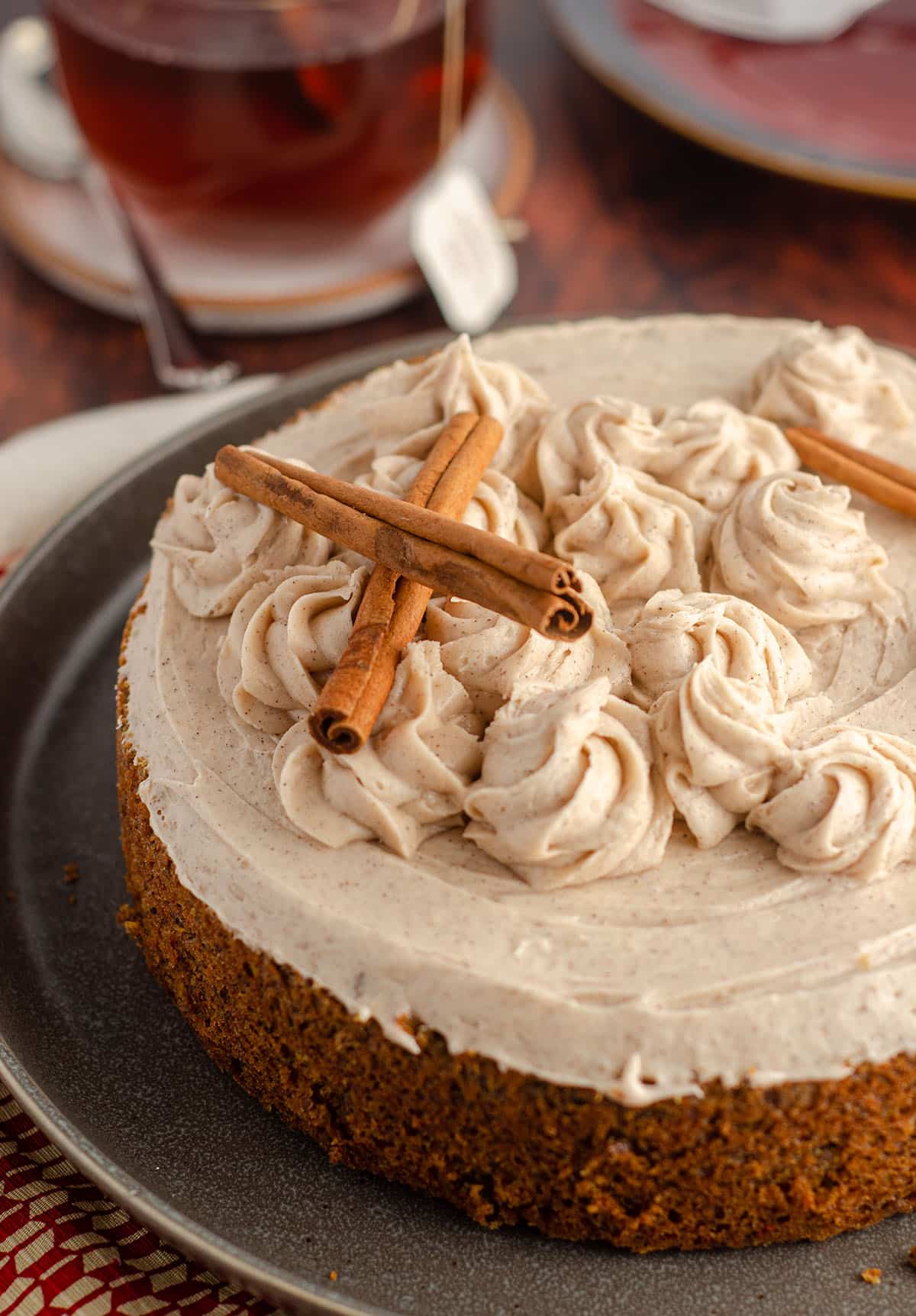 whole chai cake decorated with cinnamon sticks