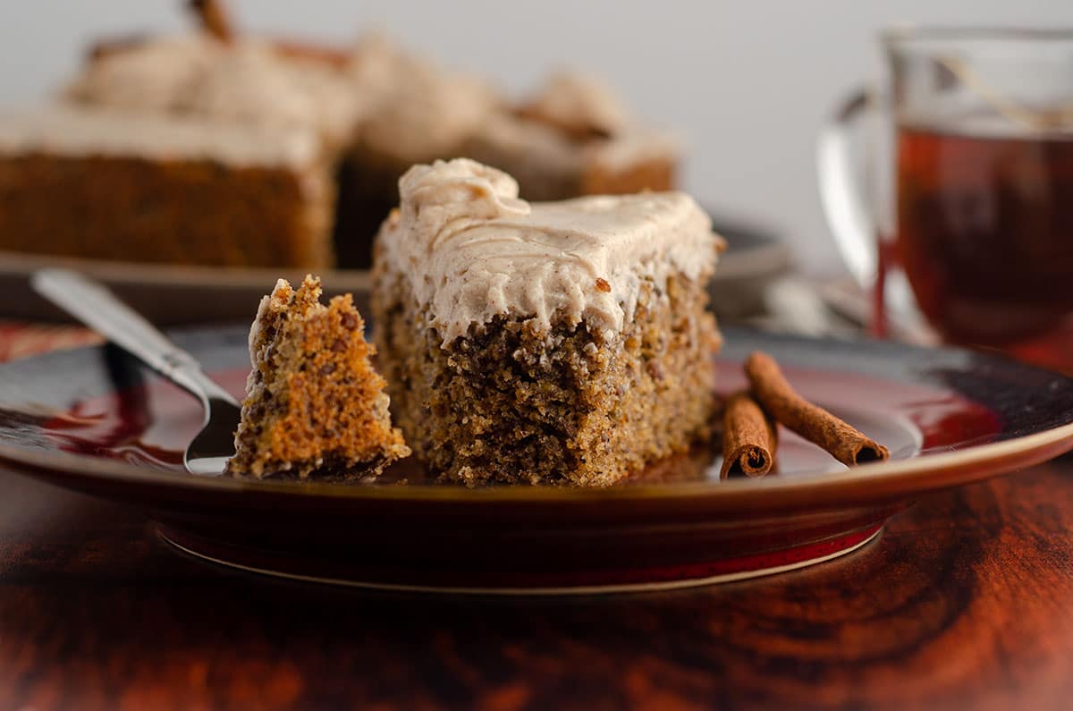 piece of chai cake with bite taken out and bite sitting on the end of a fork