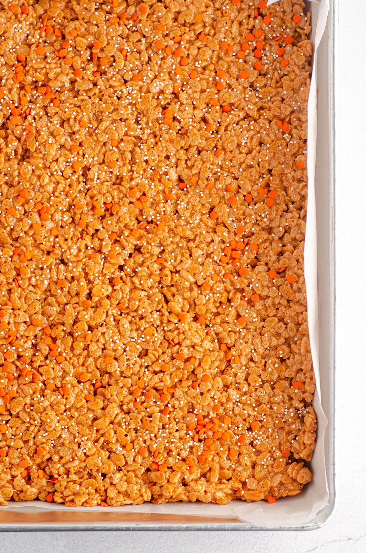 pumpkin rice krispies treats in a pan