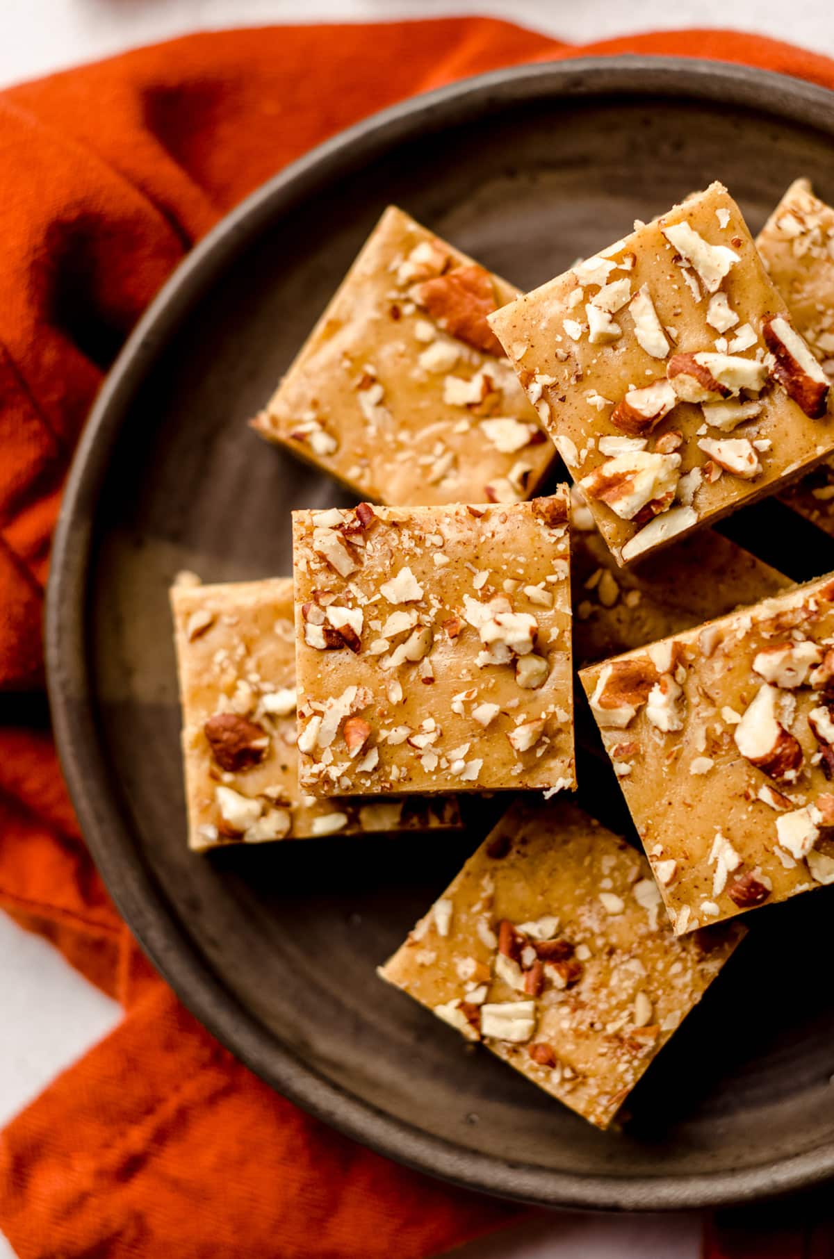 aerial photo of pumpkin fudge squares on a plate