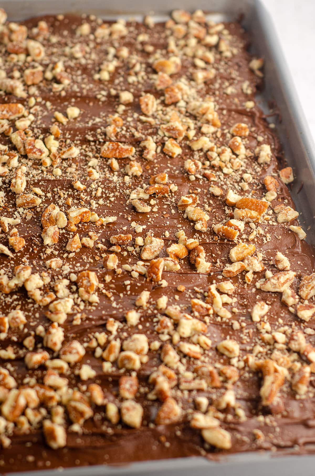 graham cracker toffee bark in baking sheet ready to cut into pieces
