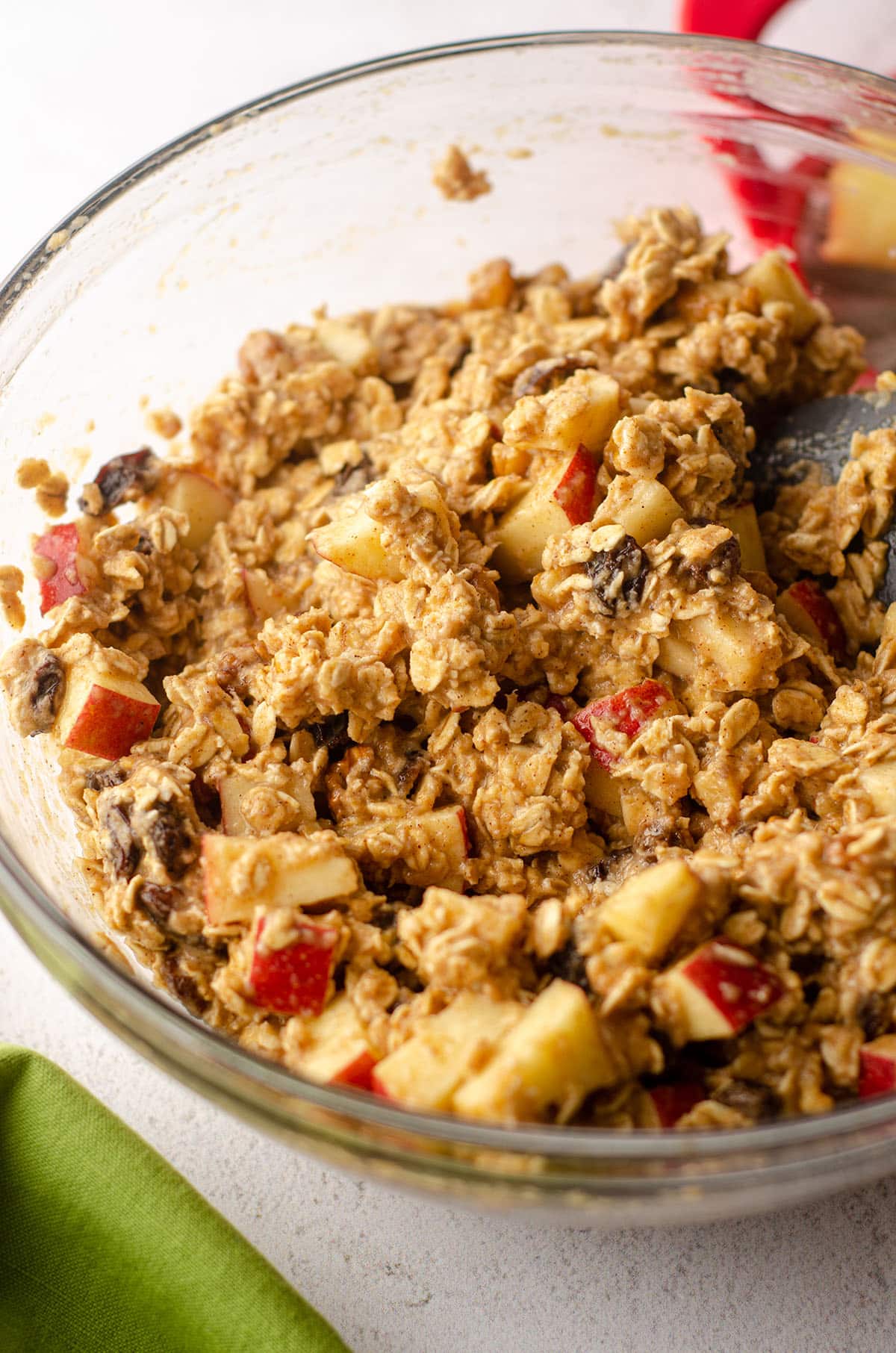 apple oatmeal mixed in a bowl ready to bake in a casserole dish