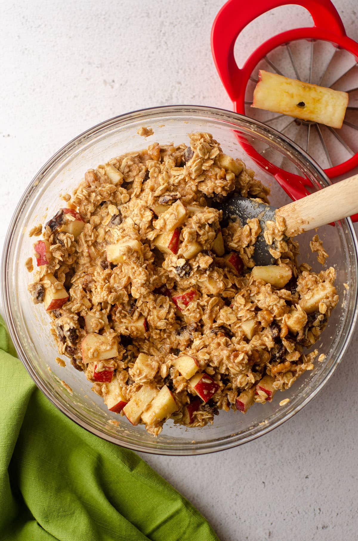 apple oatmeal mixed in a bowl ready to bake in a casserole dish