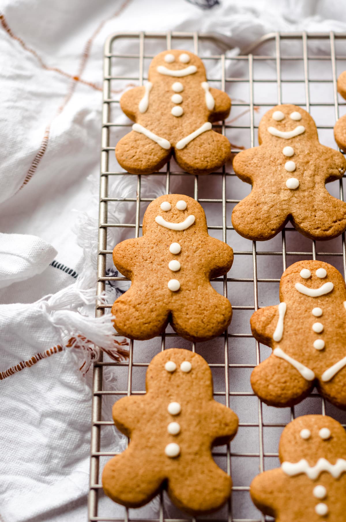 gingerbread cut-out cookies on a wire cooling rack