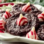 Chocolate peppermint blossom cookies on a Santa plate.