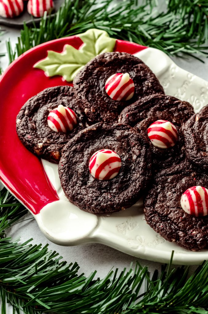 Chocolate peppermint blossom cookies on a Santa plate.