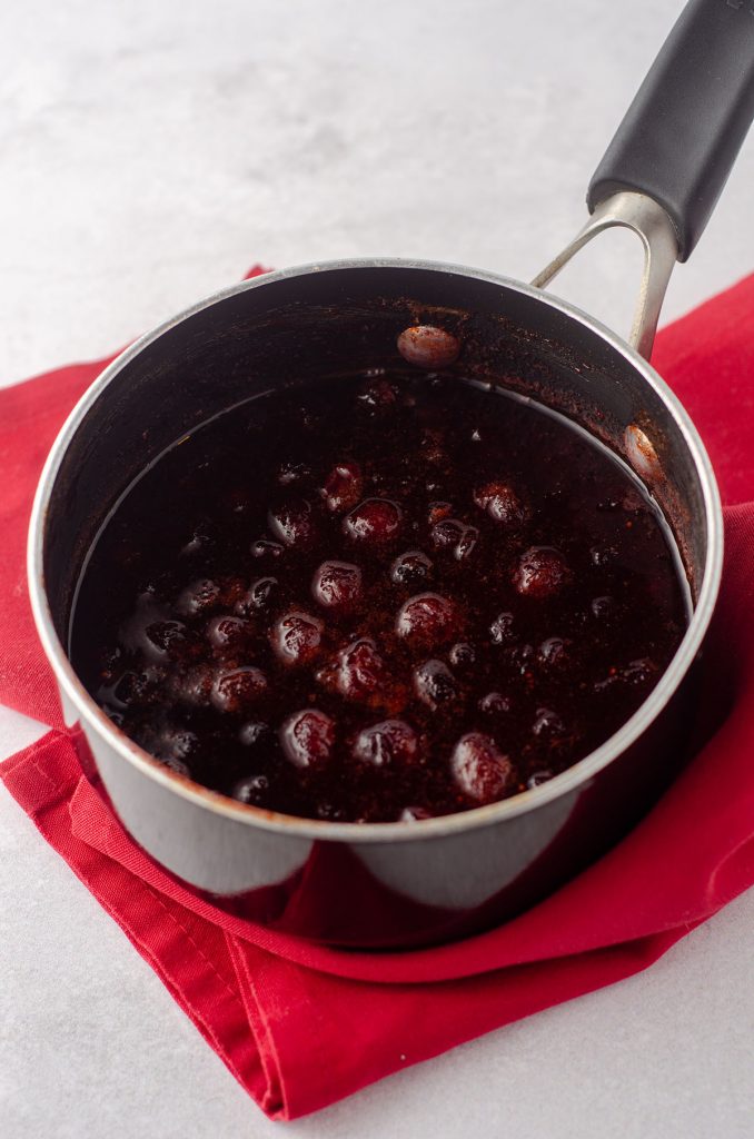 macerated cranberries in a saucepan