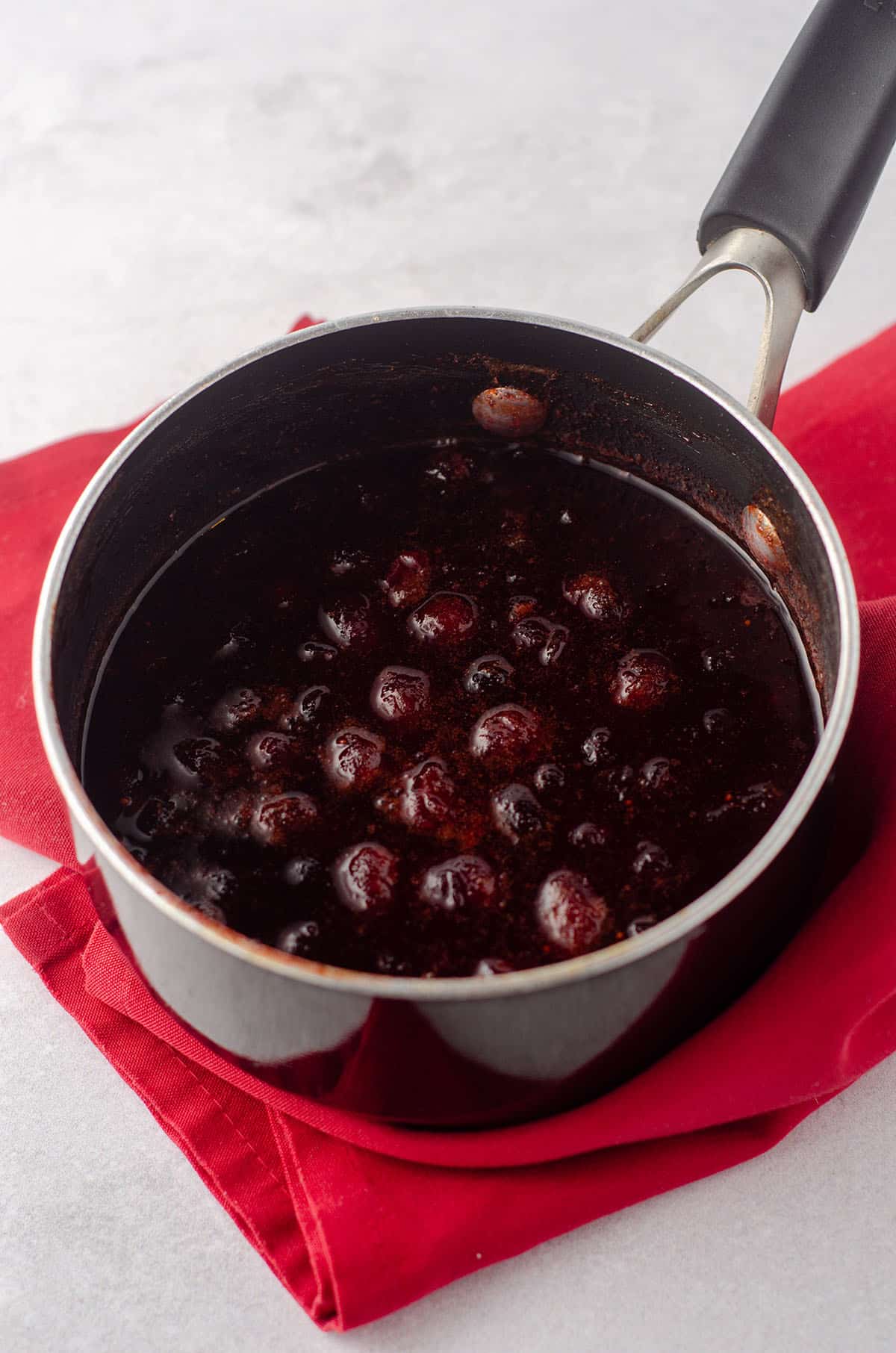 macerated cranberries in a saucepan