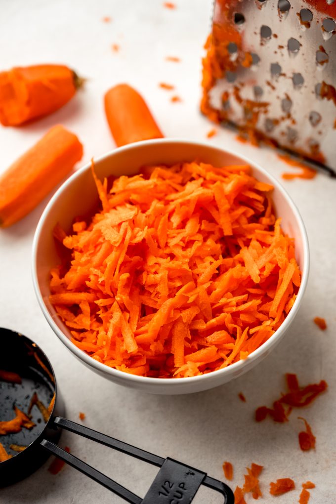 A bowl of shredded carrots.