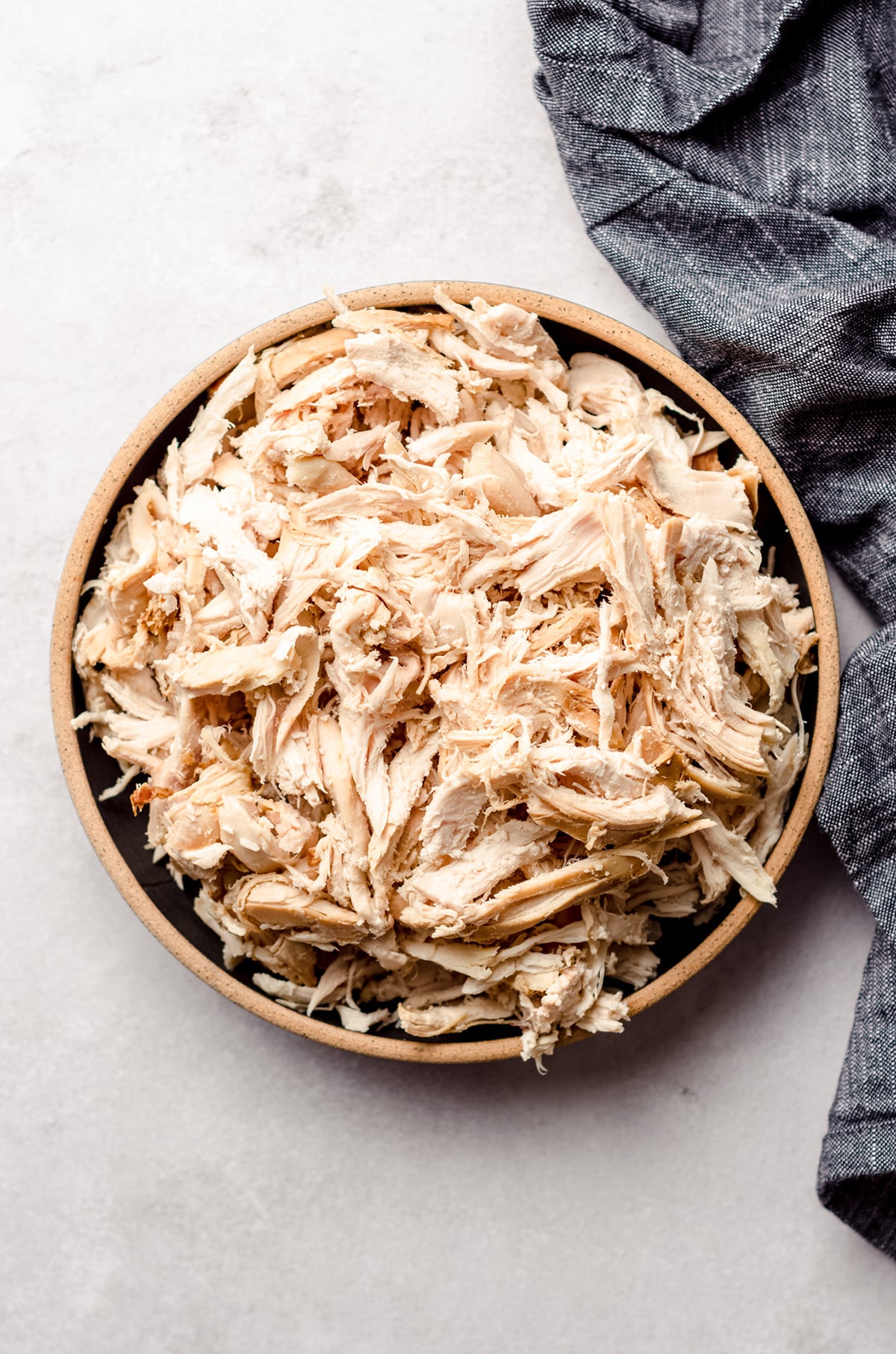 a bowl of shredded chicken in a bowl