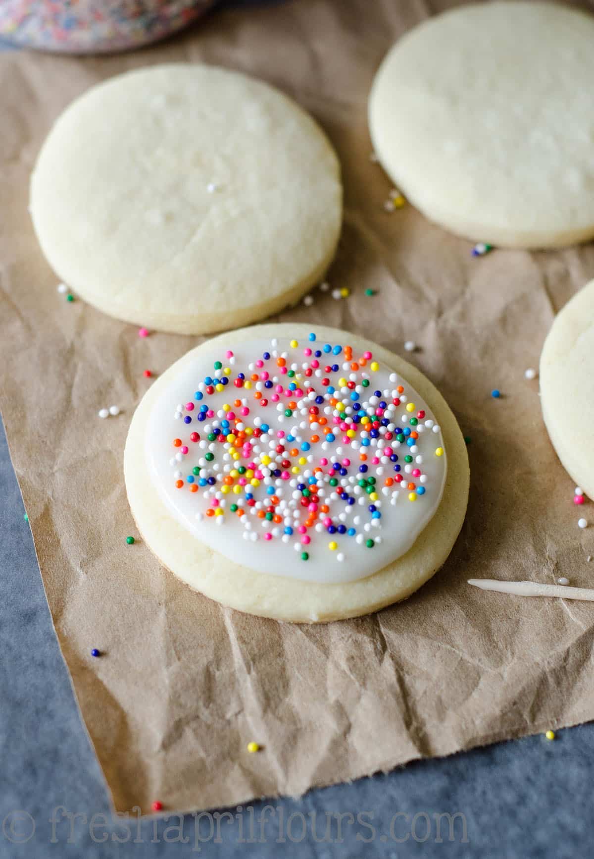 non-pareil sprinkles on a cut-out sugar cookie