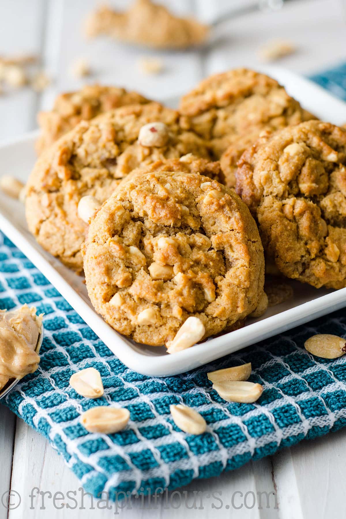 Flourless Crunchy Peanut Butter Cookies: Just 5 simple ingredients produce these crunchy, nutty, gluten free cookies. You'd never guess they have no flour!