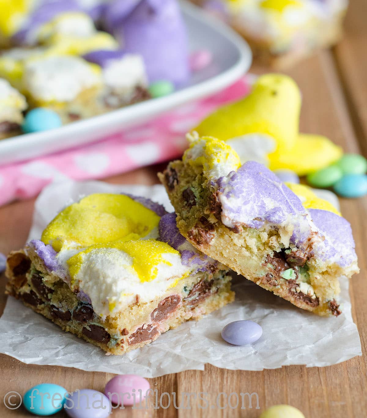 Peeps blondies on a piece of parchment paper.