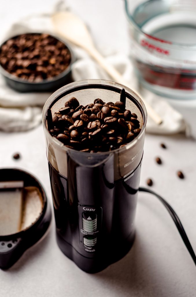 a coffee grinder full of coffee beans