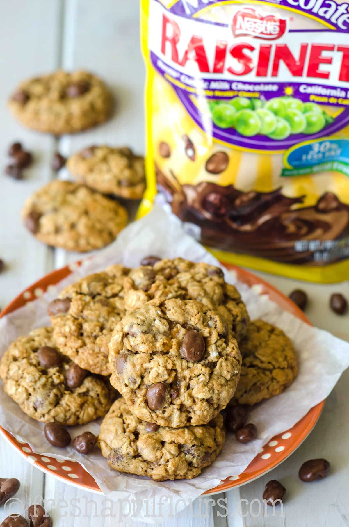 Oatmeal Raisinet cookies on a plate.