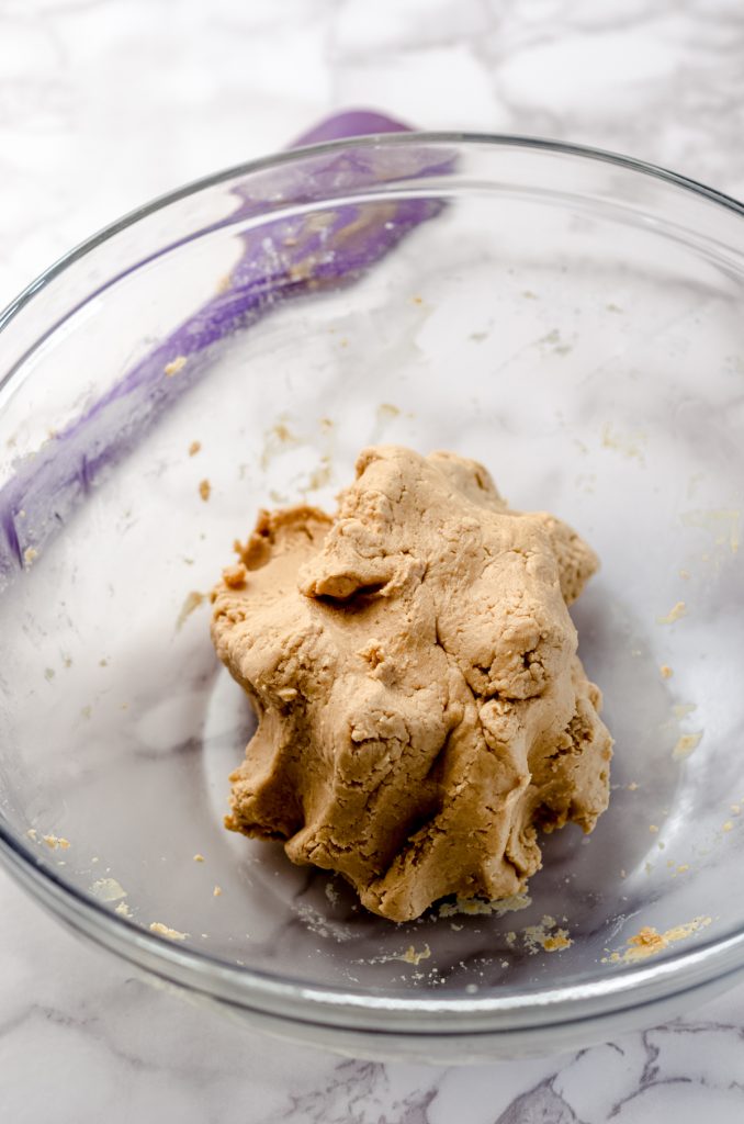Peanut butter buckeye ball mixture in a bowl.