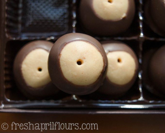 Buckeye Candy: Easy, melt-in-your-mouth peanut butter buckeye balls dipped in chocolate. A classic!