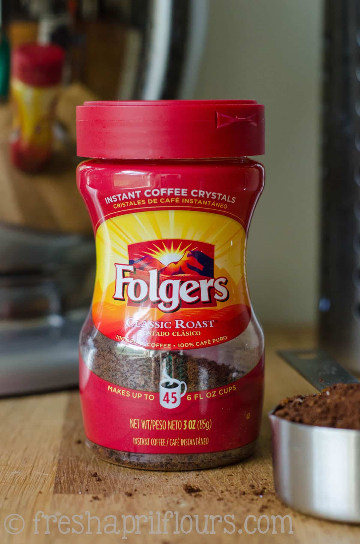A container of instant coffee granules. 