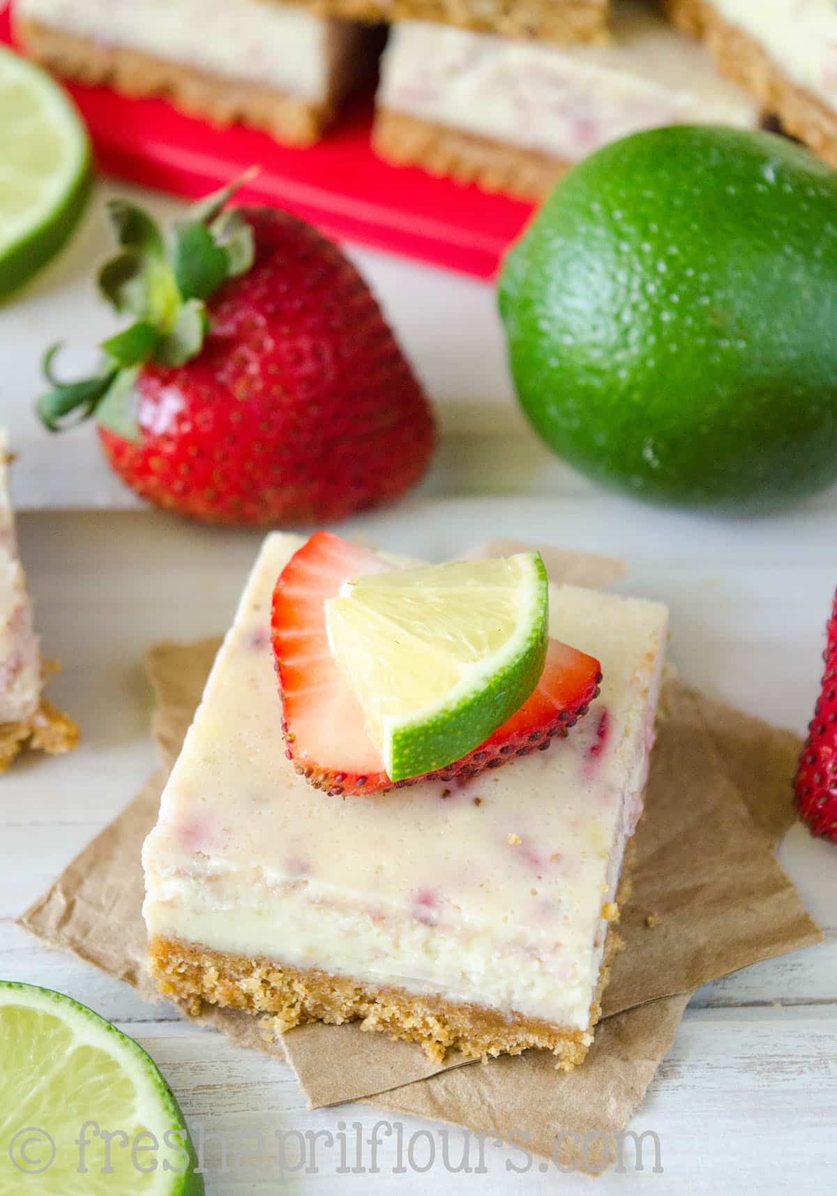 A strawberry margarita square on a piece of parchment paper.