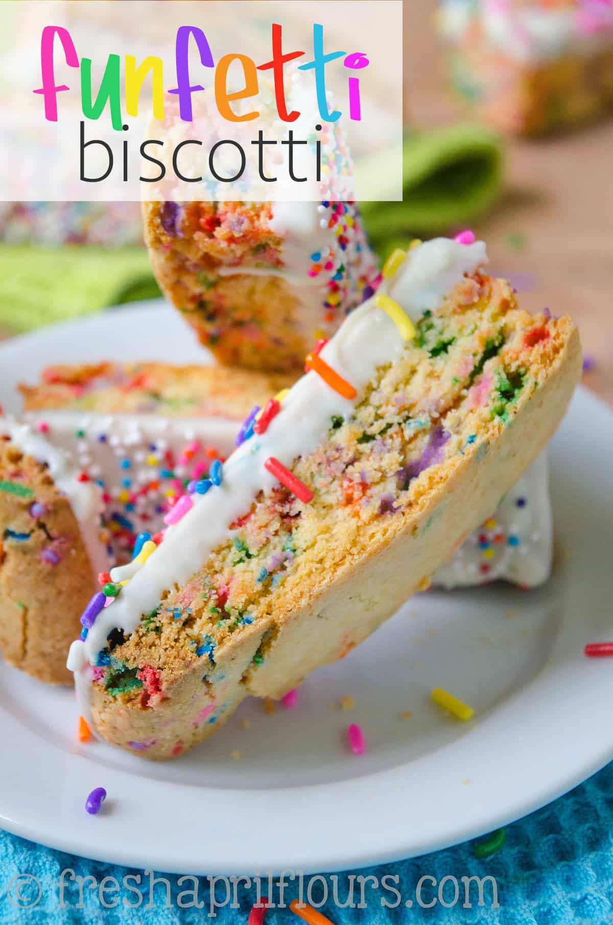 Crunchy biscotti filled with sprinkles and dipped in white chocolate, perfect for dunking in coffee. A party in your mouth and your mug! via @frshaprilflours