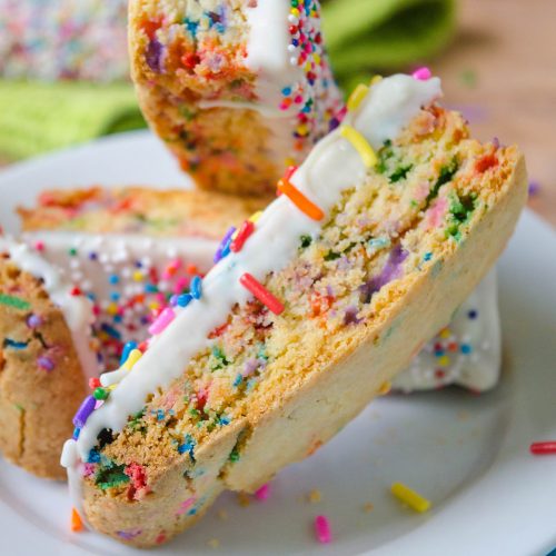 Funfetti Biscotti: Crunchy biscotti filled with sprinkles and dipped in white chocolate, perfect for dunking in coffee. A party in your mouth and your mug!