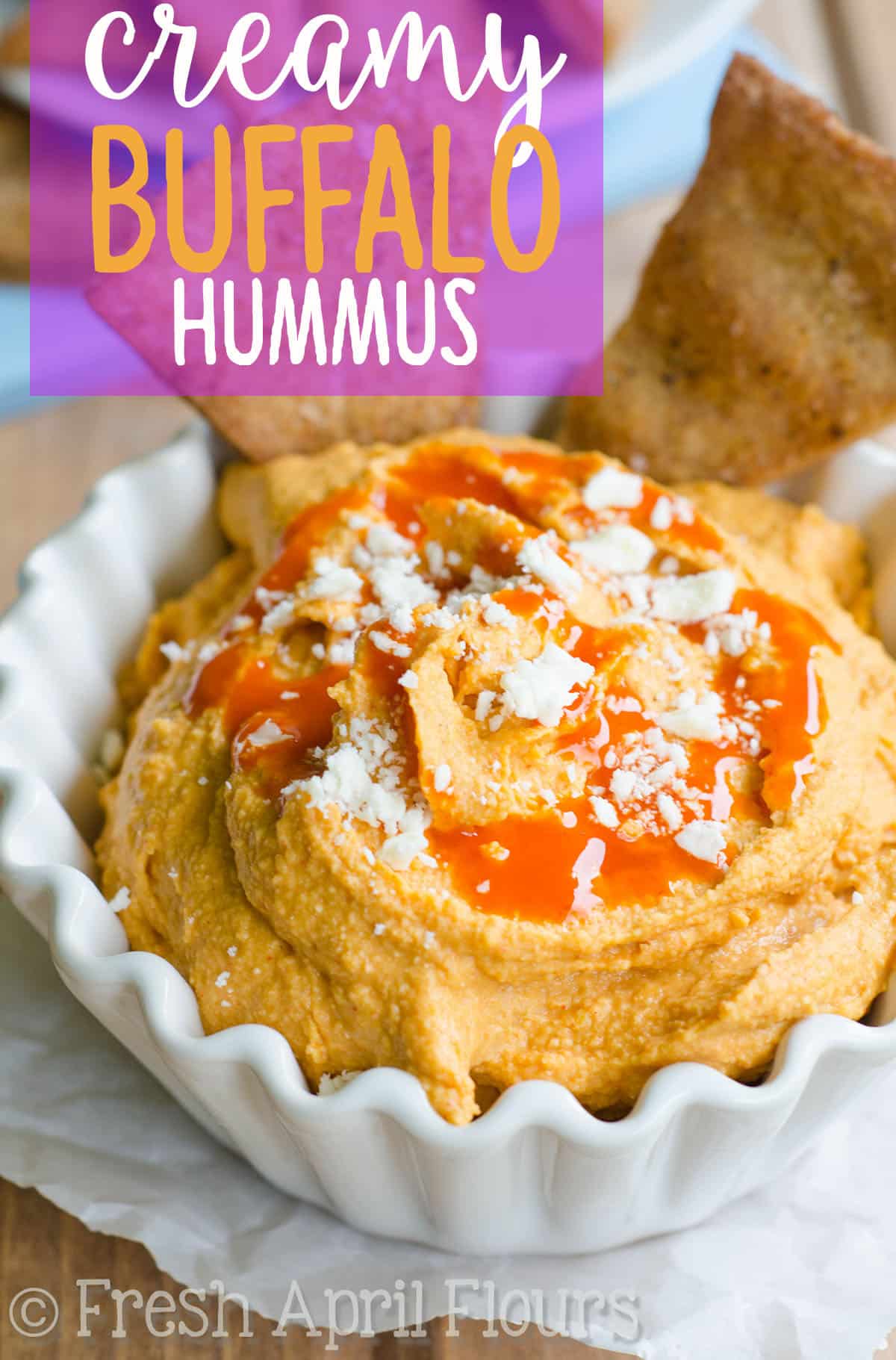 Smooth hummus loaded with spices and creamy blue cheese, perfect for dipping with homemade pita chips or your favorite vegetables. via @frshaprilflours