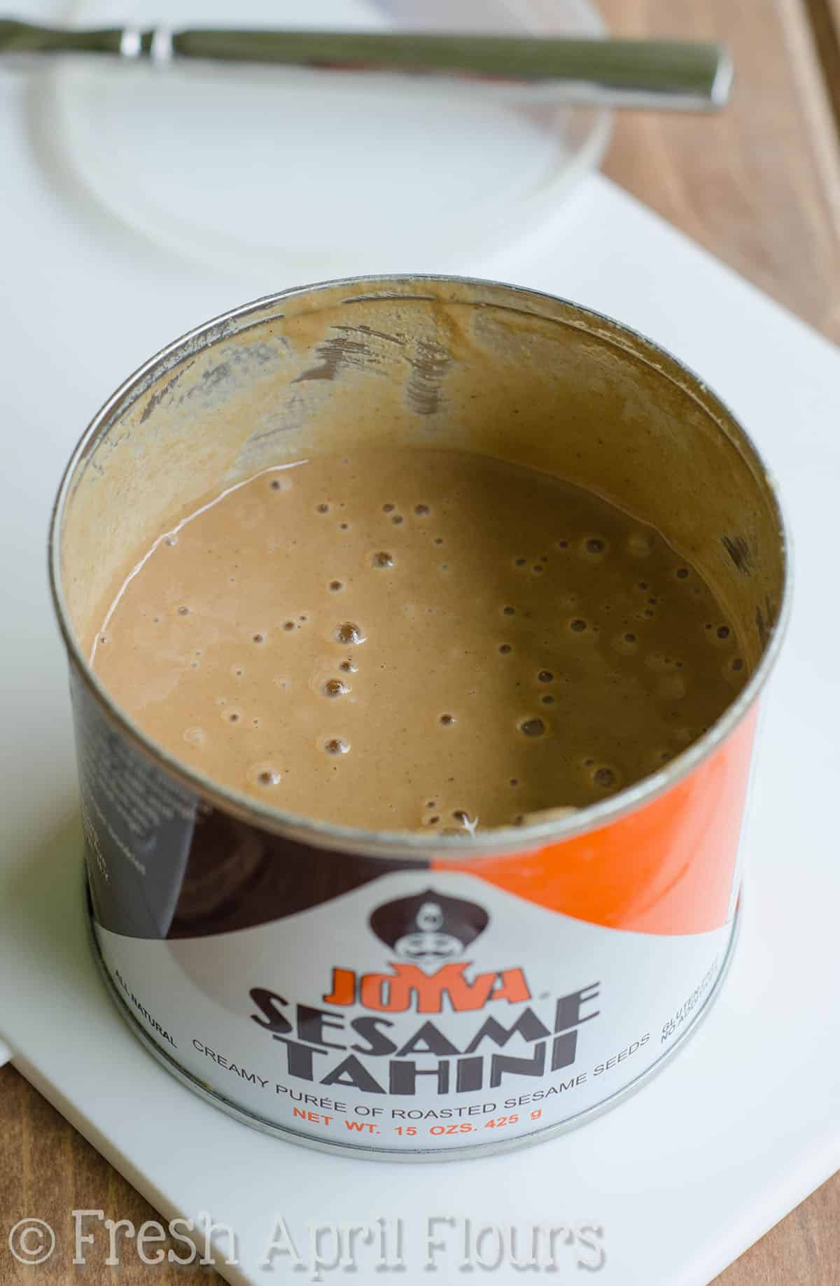 A container of tahini. 