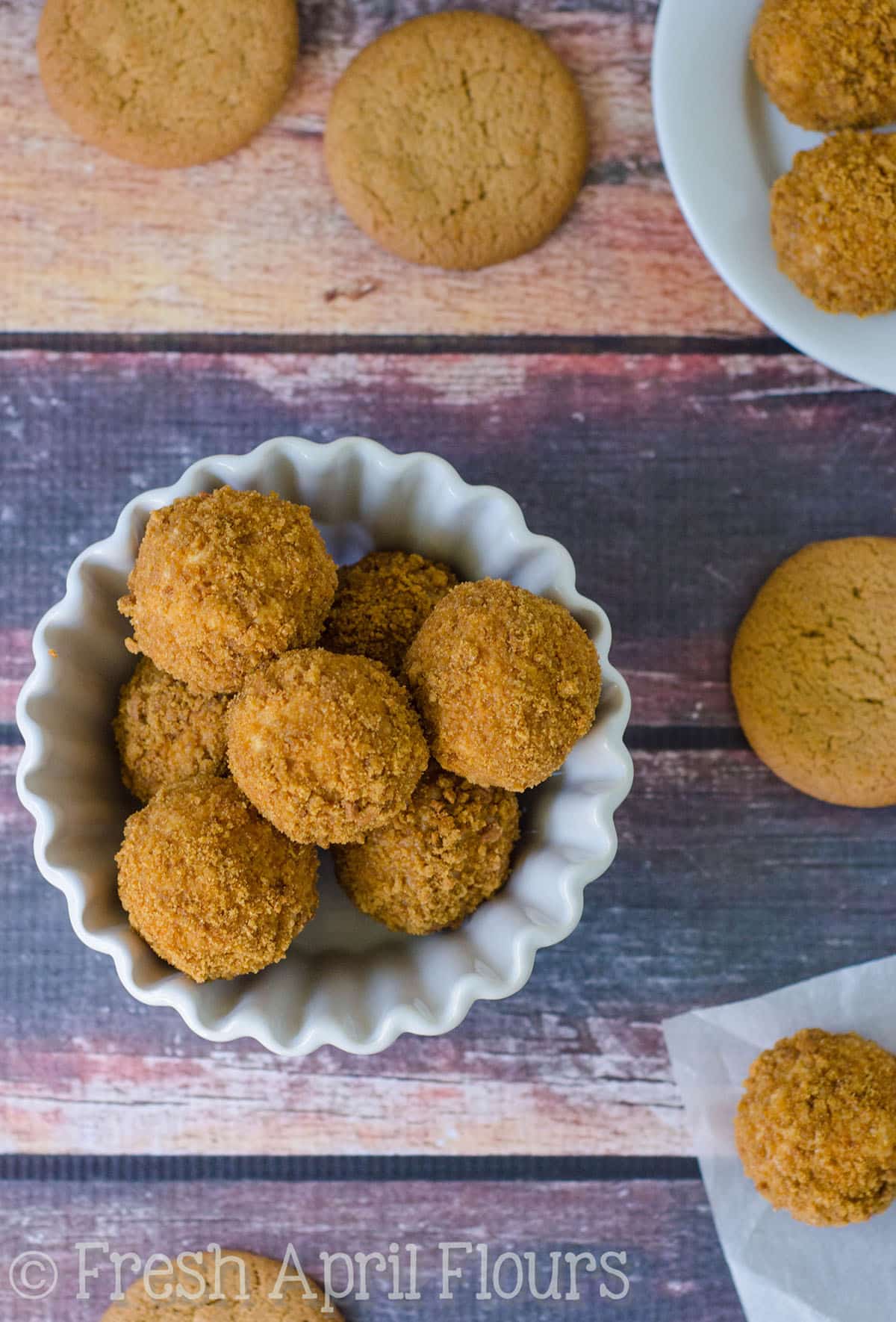 Aerial photo of gingersnap cheesecake bites in a bowl.