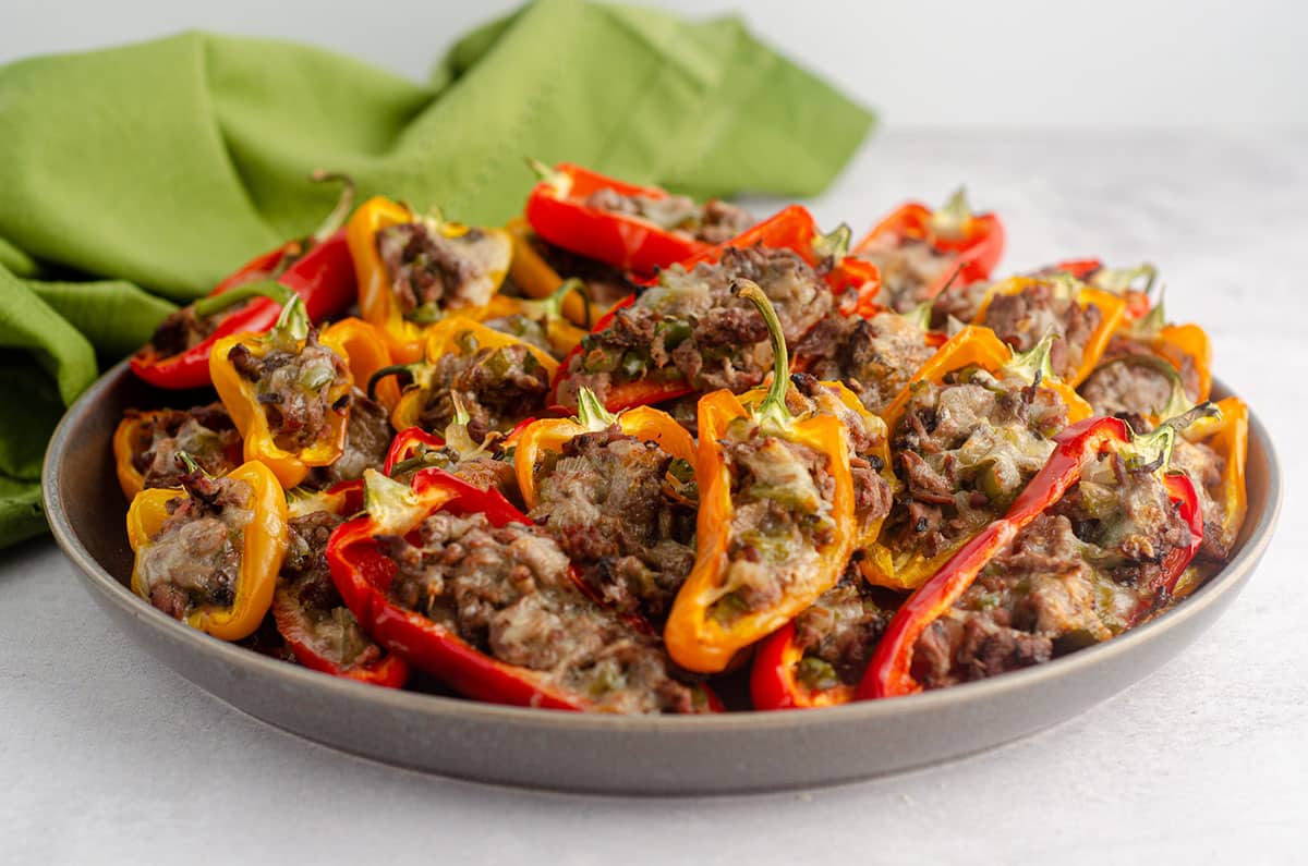 platter of mini philly cheesesteak stuffed peppers
