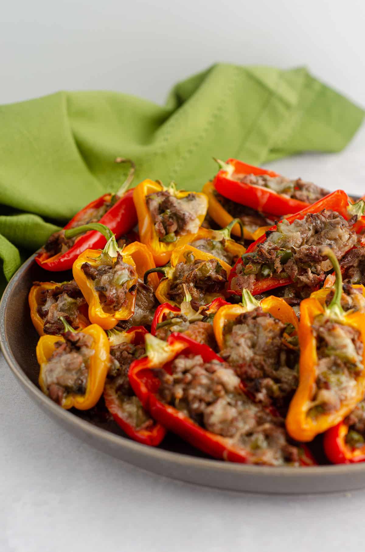 plate of mini philly cheesesteak stuffed peppers