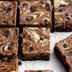 Chocolate Chip Cheesecake Swirl Brownies: Dense and fudgy scratch brownies swirled with sweet chocolate chip cheesecake.