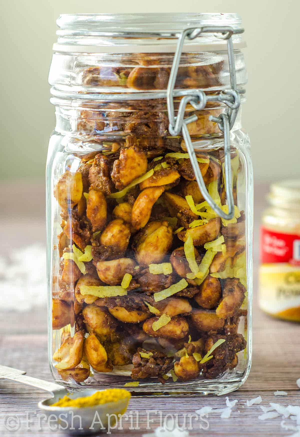 a jar of toasted coconut curry peanuts