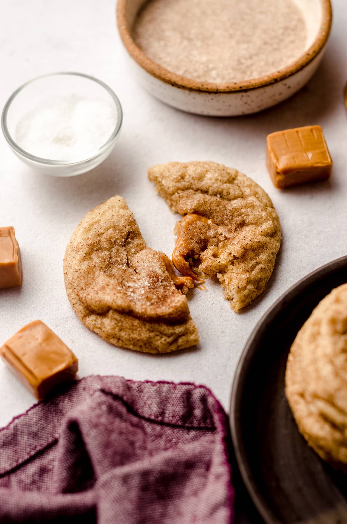 salted caramel stuffed snickerdoodle cut in half to show center