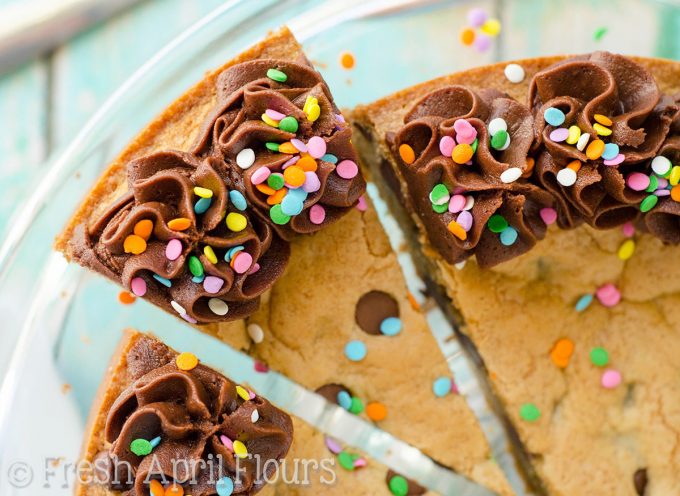 Chocolate Chip Cookie Cake with Chocolate Fudge Frosting: The best way to eat a chocolate chip cookie! Soft in the center, chewy on the edges, and the perfect canvas for decorating for your celebration!