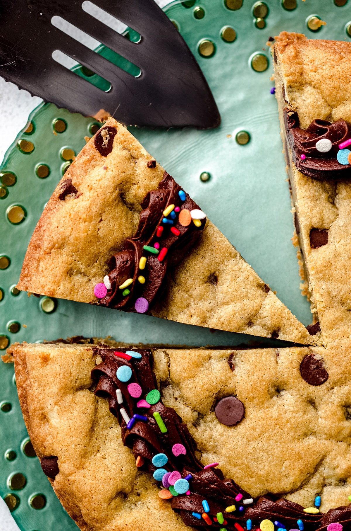 aerial photo of sliced chocolate chip cookie cake