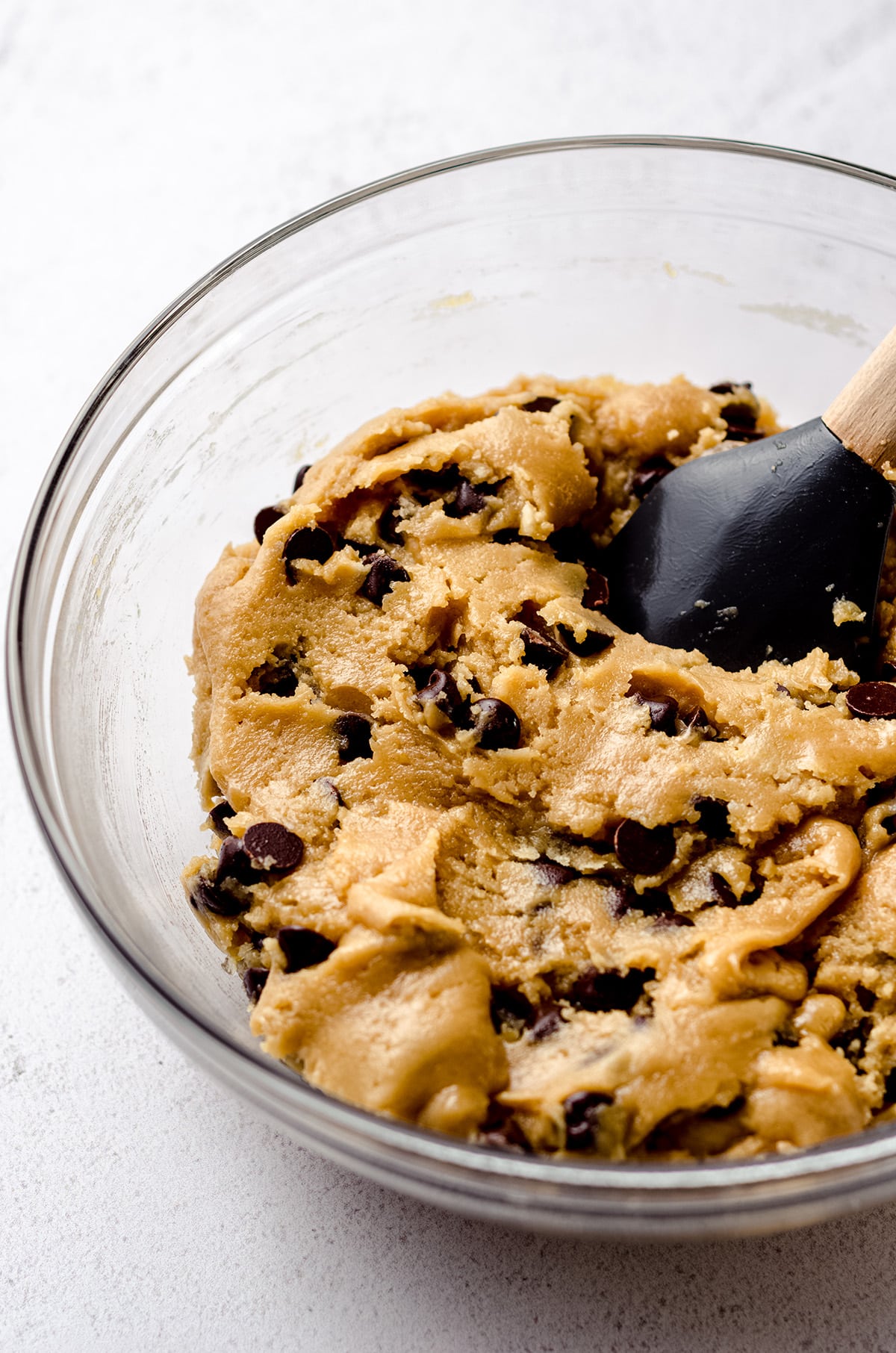 chocolate chip cookie cake dough in a bowl