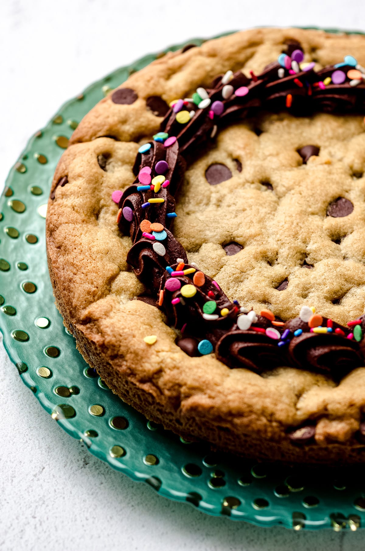 a chocolate chip cookie cake on a plate